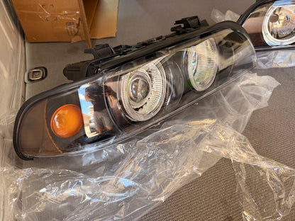 Комплект тунинг фарове с Angel Eyes за BMW E39 (1997–2003) – черни, с включени крушки